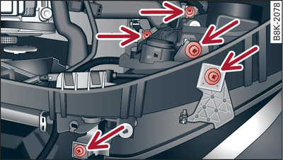 Headlight unit: Attachment points are marked by arrows